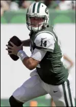  ?? Julio Cortez The Associated Press ?? New York Jets quarterbac­k Sam Darnold rolls out against the Miami Dolphins on Sept. 16 in East Rutherford, N.J.