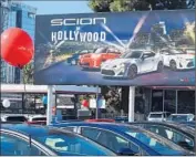  ?? Mark Ralston
AFP/Getty Images ?? SOME SCIONS will become Toyotas, starting with the 2017 model year. Above, a Hollywood dealership.