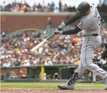  ?? THEARON W. HENDERSON/GETTY ?? Gavin Sheets hits a bases-loaded two-run RBI double against the San Francisco Giants in the top of the fourth inning on Saturday.