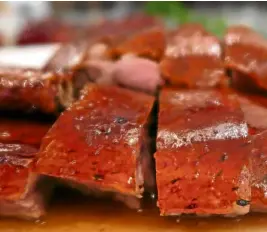  ??  ?? Respect is shown the quintessen­tial Cantonese dish, the ‘char siu’