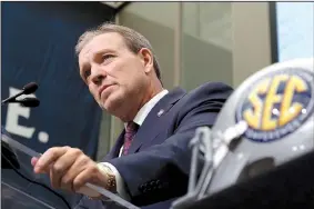  ?? AP/JOHN BAZEMORE ?? Texas A&amp;M Coach Jimbo Fisher speaks during SEC media days Monday at the College Football Hall of Fame in Atlanta. “People are never going to put more pressure on me than I put on myself in this business,” Fisher said. “This is about dealing with pressure.”