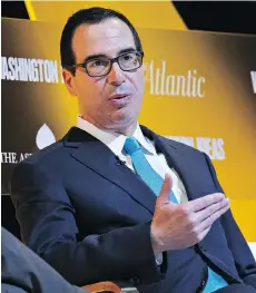  ?? ANDREW HARRER/BLOOMBERG ?? U.S. Treasury Secretary Steven Mnuchin, seen at a conference Thursday in Washington, says the Trump administra­tion’s goal of 2.9 per cent GDP over 10 years is “very, very doable.”