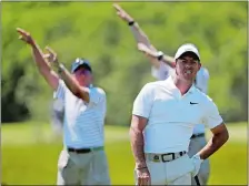  ?? JULIO CORTEZ/AP PHOTO ?? Rory McIlroy watches his approach shot from the rough on the third hole during the first round of the U.S. Open on Thursday at Southampto­n, N.Y.