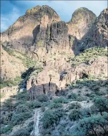  ?? Bob Wick Bureau of Land Management ?? DRIPPING SPRINGS, with its waterfall, is a must-see spot. It’s a relatively easy trek from the monument’s visitors center.