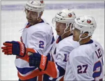  ?? GENE J. PUSKAR - THE ASSOCIATED PRESS ?? New York Islanders’ Josh Bailey (12) celebrates after scoring during the third period of an NHL hockey game against the Pittsburgh Penguins in Pittsburgh, Tuesday, Nov. 19, 2019. The Islanders won 5-4in overtime.