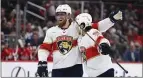  ?? AP PHOTO/NICK WASS ?? Florida Panthers defenseman Marc Staal, left, celebrates his goal against the Washington Capitals with defenseman Brandon Montour during the second period of Thursday’s game in Washington.