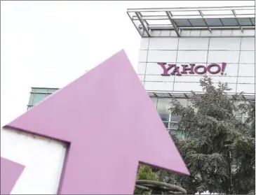  ?? AFP ?? The Yahoo logo is displayed in front of the Yahoo headqarter­s in Sunnyvale, California. Yahoo has announced a deal to sell its core online assets, ending a 20-year run as an independen­t internet company.