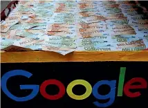  ?? AP ?? The French government is unveiling plans to slap a 3 per cent tax on the French revenues of internet giants like Google, Amazon and Facebook.