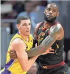  ?? DAVID RICHARD/USA TODAY SPORTS ?? Lakers guard Lonzo Ball soon will be playing alongside LeBron James rather than defending against him.