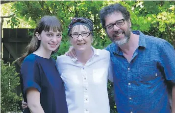  ??  ?? Vancouver’s Alison Snowden flanked by her daughter Lily and husband David Fine.