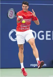  ?? VAUGHN RIDLEY/GETTY IMAGES ?? Milos Raonic plays a shot against Jared Donaldson during Raonic’s win at the Rogers Cup Thursday in Toronto.