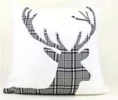  ??  ?? This holiday pillow is from the Martha Stewart Collection at Macy’s.