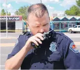  ?? GREG SORBER/JOURNAL ?? APD police officer Simon Drobik, who also works as a spokesman for the department, has earned nearly $170,000 so far this year.