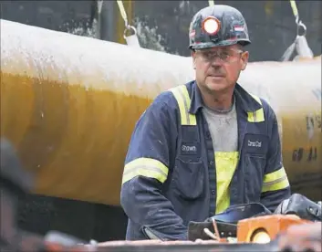  ?? Associated Press ?? A miner works June 7 at a coal mine in Friedens, Pa.