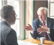  ??  ?? David Davis told the Telegraph’s Christophe­r Hope, left, he is being briefed against by the EU. He was talking on a visit to Thurrock with Tory candidate Jackie Doyle-price, right