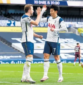  ?? Photo / Getty Images ?? Harry Kane and Son Heung-min have combined for 13 goals this season, equalling the Premier League record in just 16 games.