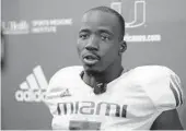  ?? LYNNE SLADKY/AP ?? Miami safety Amari Carter speaks to the media after a practice.