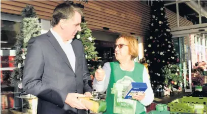  ??  ?? Metro Mayor Steve Rotheram, seen at a foodbank in Knowsley, announced free bus travel