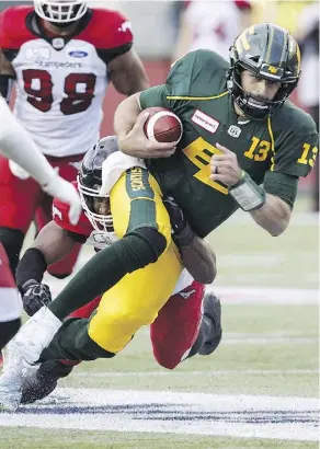  ?? JASON FRANSON/THE CANADIAN PRESS ?? Edmonton Eskimos quarterbac­k Mike Reilly is on pace to establish a new franchise record for passing yardage heading into the final third of the season Saturday against Ottawa.