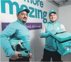  ?? Antonie Robertson / The National ?? Muhammad Khurram, left, and Muhammed Ali say they are delighted by Deliveroo awards