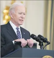  ?? EVAN VUCCI — THE ASSOCIATED PRESS ?? President Joe Biden delivers remarks about vaccinatio­ns, in the State Dining Room of the White House on Tuesday in Washington.