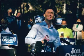  ?? JOHN AMIS/AP ?? Georgia Democratic candidate for U.S. Senate Jon Ossoff rallies supporters in Atlanta on Friday for a runoff against Republican Sen. David Perdue.