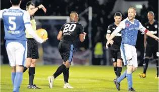  ??  ?? Game changer Shaughness­y watches on as Anderson is sent off against Rangers