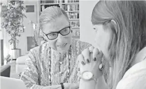  ?? MAGNOLIA PICTURES ?? Ruth Bader Ginsburg talks to her granddaugh­ter, Clara Spera, in “RBG,” which charts the justice’s career and her rise as an unlikely pop culture star.