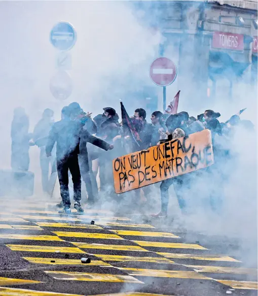  ??  ?? Students in Lyon, right, demonstrat­ed against education reforms yesterday