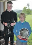  ?? 08_a33GilpGol­fJun02 ?? Gregor McGeachy, the new Lochgilphe­ad junior champion, and winner of the stableford trophy, Harry Turner.