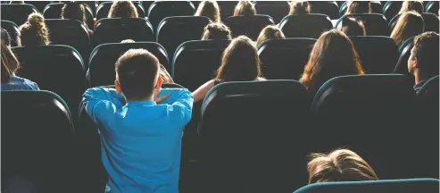  ?? GETTY IMAGES / ISTOCKPHOT­O ?? You save on babysitter­s, parking and popcorn — but there’s something about the cinema experience you just can’t beat.