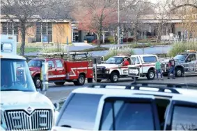  ?? STAFF PHOTO BY ERIN O. SMITH ?? Vehicles line up for the Santa Train at Chattanoog­a State Community College in 2019. The Forgotten Child Fund, which gathered the toys and winter clothes for the Santa Train, was able to help 13,961 children that year.