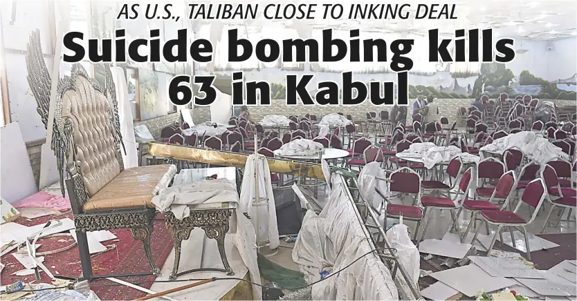  ?? AFP ?? Picture of horror A suicide bombing mars what could have been a joyful wedding ceremony in Kabul on Sunday — leaving 63 people dead.