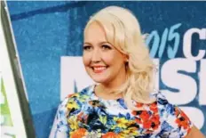  ?? SANFORD MYERS/THE ASSOCIATED PRESS ?? Early in her career, Meghan Linsey refused a deal with the NRA and recently took a knee after singing the Star-Spangled Banner at an NFL game