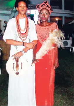  ??  ?? Saints Internatio­nal models depicting a Benin couple.