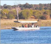  ?? Photo: Aron Mushaukwa ?? Tragedy… A boat on the Chobe river where six children died when the boat they were travelling in capsized few minutes after leaving the Nakabolelw­a shore.