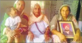  ?? HT PHOTO ?? Family members of a farmer, Jaskaran Singh, who committed suicide due to debt in July.