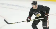  ?? ?? Brett Connolly skates during practice at the United Center. JOSE M. OSORIO / CHICAGO TRIBUNE