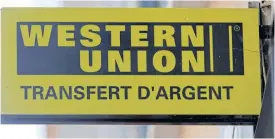  ?? REUTERS ?? The logo of a Western Union money transfer point is seen in Marseille, France.