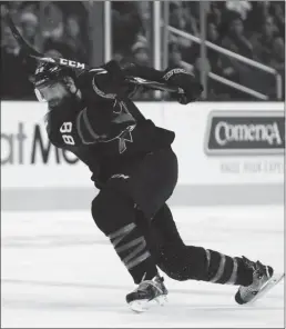  ?? The Bay Area News Group/ TNS ?? Brent Burns, seen here taking a shot against the Washington Capitals in a Feb. 14 game at SAP Center, has the flu and is questionab­le to play Sunday against the Chicago Blackhawks.