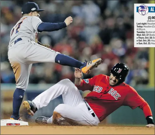  ?? — THE ASSOCIATED PRESS ?? Astros second baseman Jose Altuve forces the Red Sox’s J.D. Martinez out after Xander Bogaerts hit into a double play during Game 1 of their American League Championsh­ip Series in Boston last night.