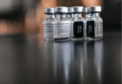  ?? Brett Coomer / Staff photograph­er ?? Vials of Pfizer vaccine await the arms of Legacy Restaurant­s employees, part of a greater campaign by Houston restaurant­s.