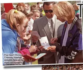  ?? ?? Pop heart-throb Chesney Hawkes delights fans as he signs autographs