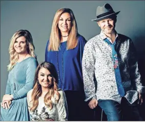  ?? Contribute­d ?? Kelly Nelon Clark, her husband Jason Clark and their daughters, Amber and Autumn, complete the musical group The Nelons.