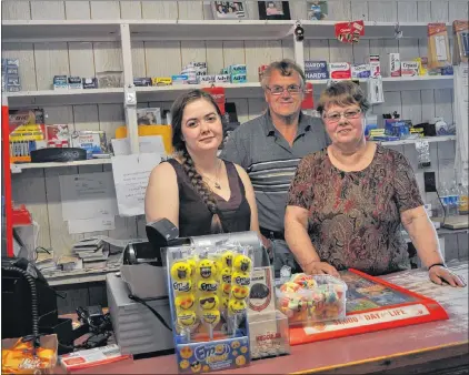  ?? ROSALYN ROY ?? Student Tori Skinner (left) works at Coley’s Store in Ramea during the summer. Owner Frances Coley and her brother, George Barter, are there year-round.