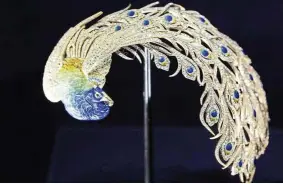  ??  ?? Anita Delgado’s Peacock brooch in gold, diamond and enamel. — Photos: Victoria and Albert Museum
