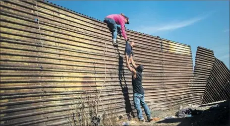  ?? Pedro Pardo AFP/Getty Images ?? VOTING 5-4, the Supreme Court denied President Trump’s request to bar asylum claims by immigrants who cross the border illegally.