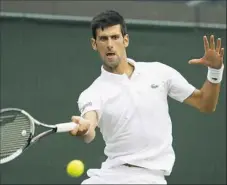  ?? Kirsty Wiggleswor­th/Associated Press ?? Novak Djokovic, 31, is seeking his 13th Grand Slam title.
