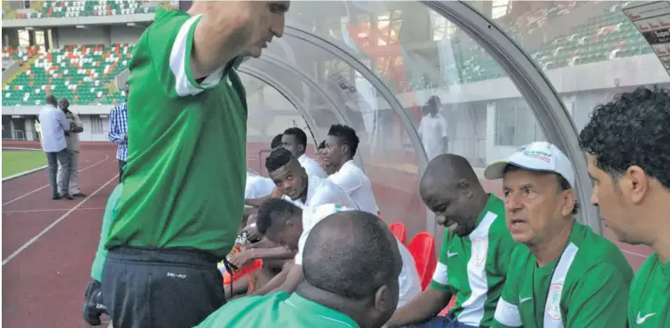  ?? Photo: The Eagle Online ?? Nigeria manager, Gernot Rohr(with white cap) with his coaching crew in Moscow, Russia as they prepare for the FIFA World Cup.