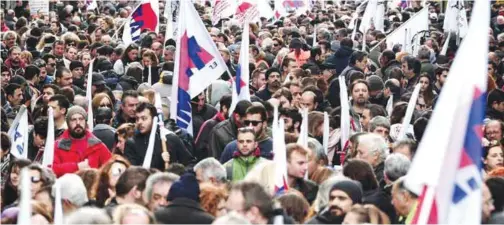  ??  ?? ATHENS: Hundreds of people gather before taking part in a protest march marking a 24-hour general strike on Thursday. — AFP